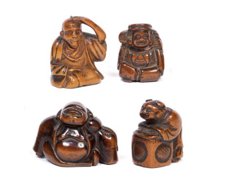 Four carved wood netsuke Japanese, Meiji, to include a figure resting on a box and three others