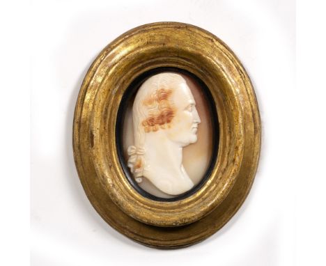 Oval shell portrait  carved with profile view of George Washington in gilt frame, 5.5cm