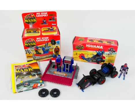 Kenner - M.A.S.K - Two boxed M.A.S.K action figure sets. Lot consists of M.A.S.K. #37560 Iguana; with #37620 Pit stop catapul