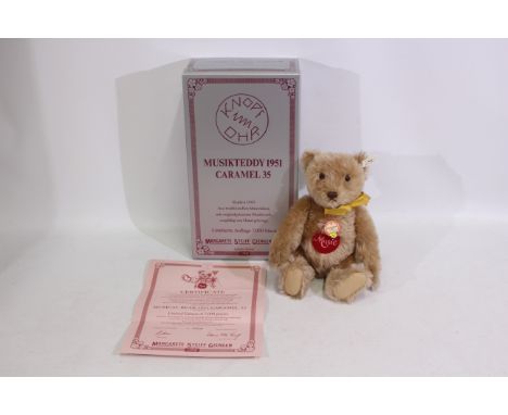 Steiff - A boxed limited edition #408458 caramel mohair Steiff bear - The '1951 Musical Bear' has metal joints, stitched nose