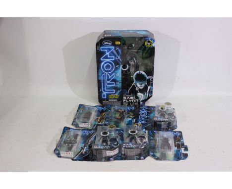 Spin Master - Disney - A boxed and carded collection of action figures and diecast model relating to 'Tron Legacy'. Lot inclu