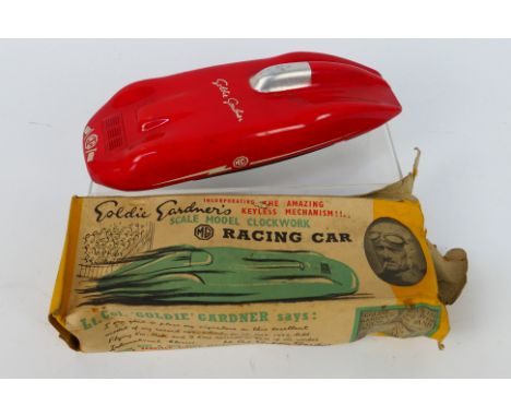 Minimodels - A boxed 'Goldie Gardener's' MG Racing Car pull-back action clockwork model by Minimodels. The red aluminium bodi