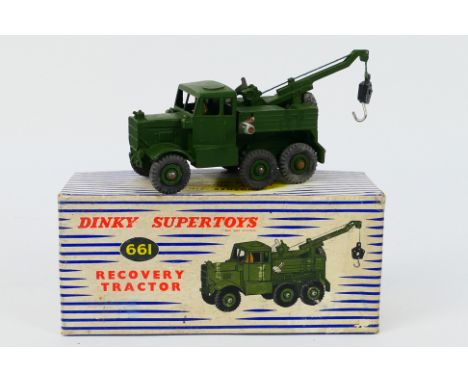 Dinky Toys - A boxed military Dinky Toys #661 Recovery Tractor. The model has a some minute marks but overall appears to be i