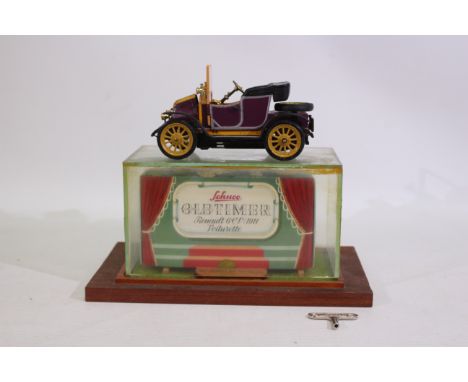 Schuco - A tinplate clockwork Schuco #1230 1911 Renault 6CV Voiturette. The model appears to be in Excellent slightly 'displa