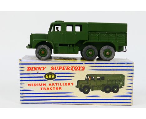 Dinky Toys - A boxed military Dinky Toys #689 Medium Artillery Tractor. The model has a some very small nicks in a couple of 