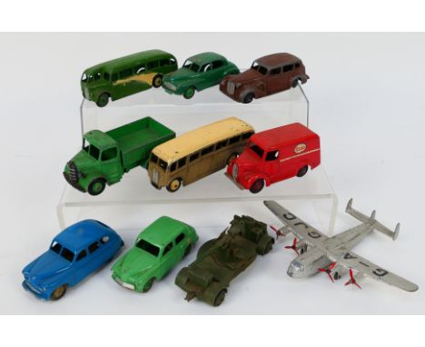 DInky Toys - An unboxed collection of playworn diecast model vehicles and accessories from Dinky Toys. Lot includes Dinky Toy