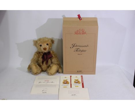 Steiff - A limited edition boxed #670374 mohair Steiff bear - 'Millenium' bear has plastic eyes, stitched nose and mouth, met