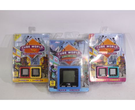 Radica - Three carded Radica 'Cube World electronic games. Lot consists of a Cube World 'Global Getaway' with a Cube World 'S