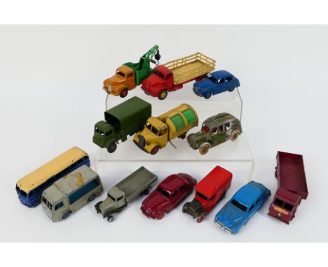 DInky Toys - An unboxed collection of playworn diecast model vehicles and accessories from Dinky Toys. Lot includes Dinky Toy