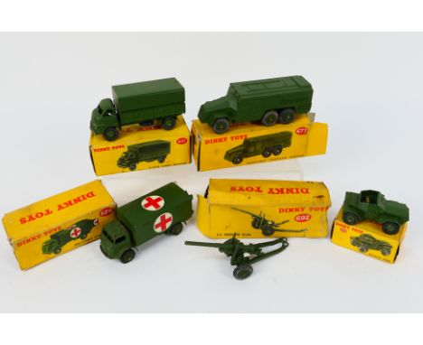 Dinky Toys - A group of five boxed military Dinky Toys. Lot consists of Dinky Toys #673 Scout Car; #626 Military Ambulance; #