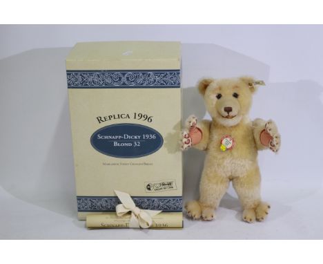 Steiff - A boxed limited edition #408243 Steiff bear - The 'Schnapp-Dicky 1936' bear has plastic eyes, stitched nose, metal j