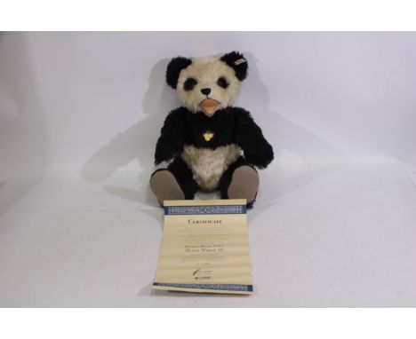 Steiff - A boxed limited edition #408335 mohair panda bear - The replica 'Panda Bar 1951' has metal joints, stitched nose, pl