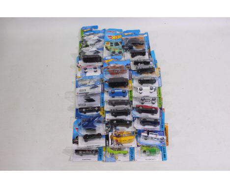 Hot Wheels - A mainly short card collection of 29 TV and Film related Hot Wheels. Lot includes Ghostbuster Ecto-1; The A-Team