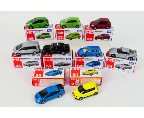 Takara Tomy Tomica - Nine boxed Japanese themed diecast vehicles by Tomy, all around 1:60-1:64 scales. Lot includes Tomy #94 