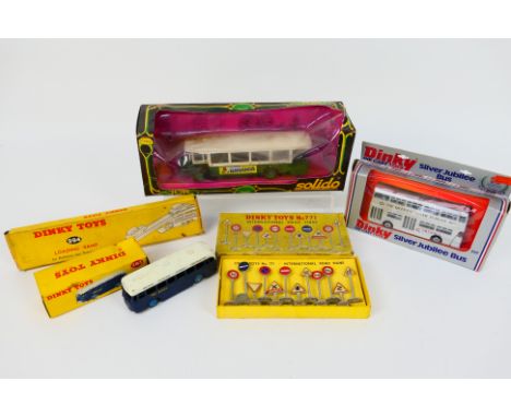 Dinky Toys - Solido  - A small group of boxed Dinky Toys and accessories with a boxed Solido bus. Lot consists of Dinky Toys 