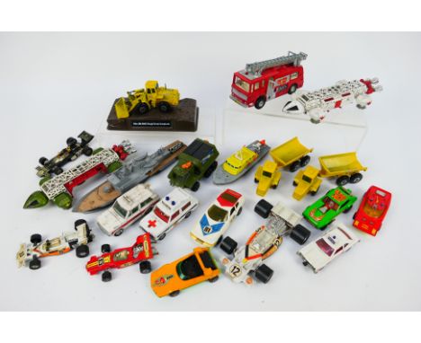 Dinky Toys - Matchbox - Corgi - An unboxed and playworn collection of diecast model vehicles. Lot includes Dinky Toys Space 1