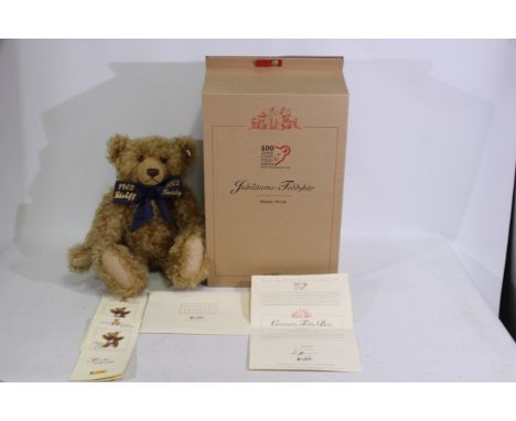 Steiff - A limited edition boxed #670985 curly mohair Steiff bear - The 'Centenary Teddy Bear' has plastic eyes, stitched nos