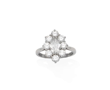 A diamond cluster ring, 1999The marquise-cut diamond within a brilliant-cut diamond surround, mounted in platinum, diamonds a