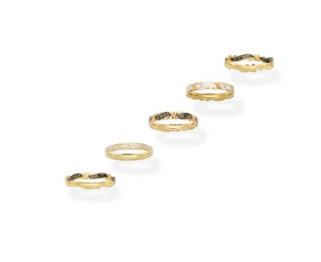 A collection of gold and enamel mourning rings,  circa 1752-1777Comprising five scrolling or straight gold bands decorated wi