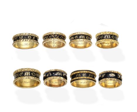 A collection of enamel mourning rings, circa 1820-1830Comprising eight rings, decorated with black enamel and gilt inscriptio