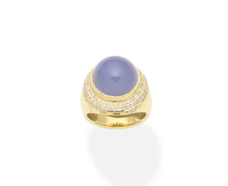 A chalcedony and diamond ring, by Theo Fennell, 2003The circular chalcedony cabochon within a triple surround of brilliant-cu