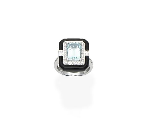 An aquamarine, onyx and diamond dress ringThe step-cut aquamarine within a brilliant and baguette-cut diamond and onyx surrou