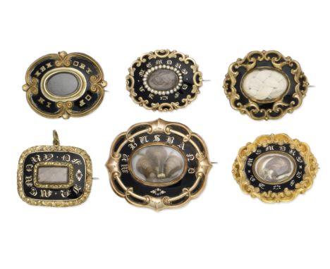 A collection of mid 19th century mourning brooches/pendantsComprising six oval and oblong plaques, each with a central glazed