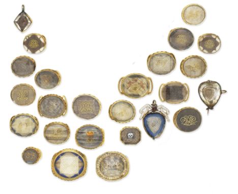 A collection of English memorial jewels, late 17th - mid 18th centuriesComprising: twenty-two slides, two pendants and one br