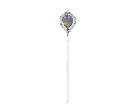 An Art Deco gem-set jabot pin, circa 1925The pear-shaped black opal cabochon within an openwork geometric surround, millegrai