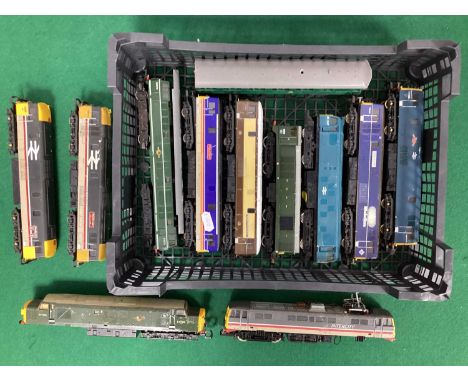 Twelve British 00 gauge Diesel and Electric locomotives by Lima, Bachmann and others, for spares or repair, some parts may be
