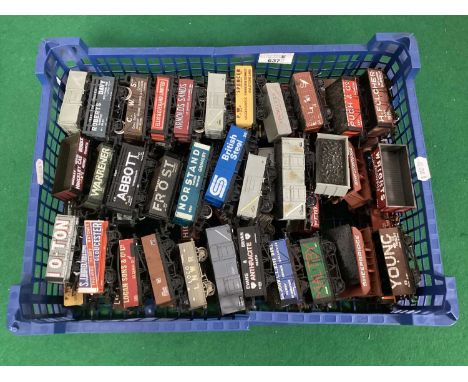 Approximately Fifty 00 gauge 4-wheel open and hopper wagons by Hornby, Mainline, Bachmann and others, including a variety of 