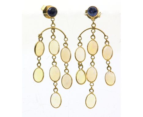 A pair of drop earrings with cabochon cut sapphires and opal drops, collet set in 14 ct gold, length 4 cm.   CONDITION14 ct w