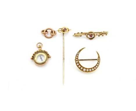 Seed pearl crescent brooch, testing as 15 ct, swivel compass fob, ruby stick pin, pink paste brooch and three belcher links a