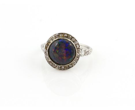 Art Deco opal mosaic and diamond cluster ring, set with old and Swiss cut diamonds, mount testing as platinum, ring size K.  