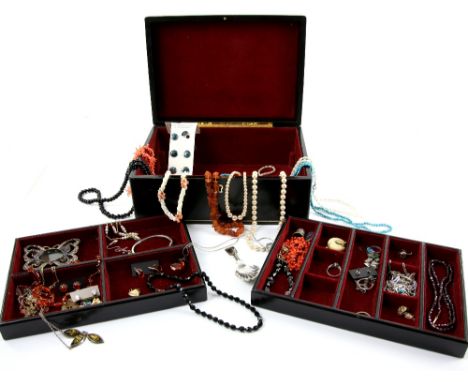 Large leather jewellery box containing mainly costume jewellery, shell cameo pendant in 18 ct mount, single clip on earring i