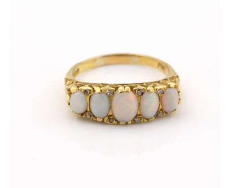 Opal and old cut diamond ring, five cabochon cut opals, mounted in 18 ct yellow gold scrolled setting, hallmarked London 1967