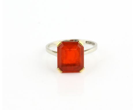 Vintage dress ring, rectangular step cut fire opal, estimated weight 4.20 carats, mounted in yellow and white metal stamped 1