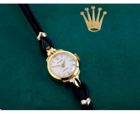Rolex Ladies watch reference 9181 in 18 carat gold case the  signed enamel Dial With Applied Yellow Gold Hour Batons and Matc