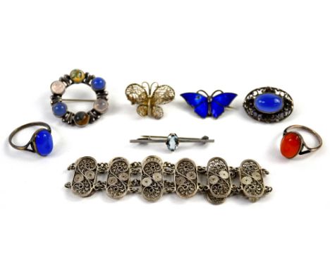 A mixed group of costume jewellery, five silver brooches, including one set with an oval cut aquamarine,  blue enamel butterf