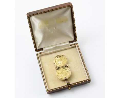 A group of gold jewellery, aesthetic movement double butterfly and floral brooch, testing as 18 ct, boxed engine turned cuffl