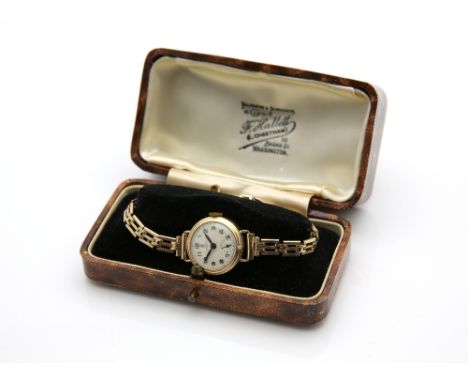 Rolex Tudor ladies wristwatch in circular  9 cart gold case, the signed dial with applied Arabic numerals within railway minu