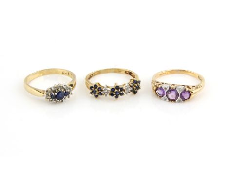 Seven rings, including  one sapphire and diamond cluster, another sapphire and diamond, both ring size M, amethyst and diamon