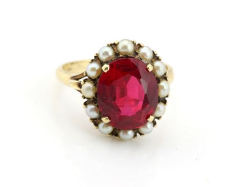 Synthetic ruby and pearl cluster ring, central stone measuring 12 x 10mm, mounted in 9 ct yellow gold, ring size P.   CONDITI