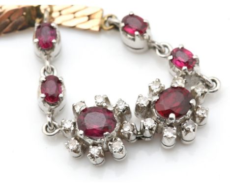 Ruby and diamond bracelet, set with six oval cut rubies and Swiss cut diamonds, flat curb links, 9ct gold 16.5cm in length.  