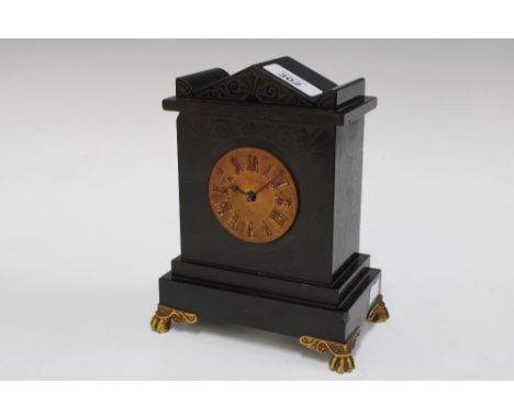 Small black slate mantle clock, with gilt painted brass feet, inscribed Hawley's Coventry Street London on the back plate, 19