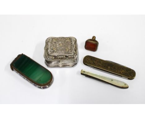 White metal trinket box with filigree lid, a cornellian intaglio seal, vesta case with green agate and enamel decoration, two