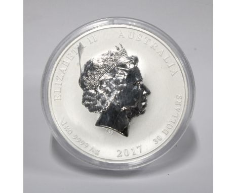 A 2017 Australian $30 1kg 9999 grade silver 'coin', Year of the Rooster, encapsulated.