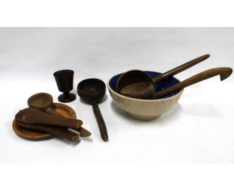 Antique kitchenalia, including a pottery mixing bowl, 30 x 12cm, three large wooden ladles, fruit press and some other treen 