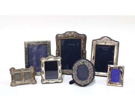 Collection of small six silver photograph frames and one unmarked white metal frame, largest 10 x 14cm (7)