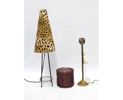 A table lamp on hairpin legs, with faux leopard fur shade, 66cm, together with a brass table lamp and a purple beaded shade (